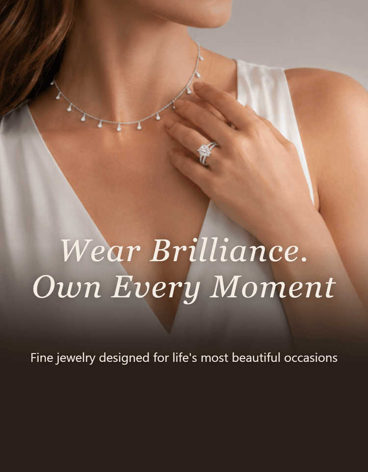 A close-up lifestyle shot of a woman wearing a delicate 14 carat white gold necklace with small dangling charms and a matching 14 carat white gold ring on her finger, set against a soft gray background with promotional text overlays.